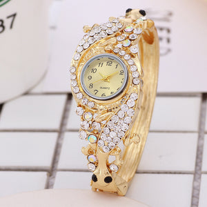 Diamond and gold bracelet watch