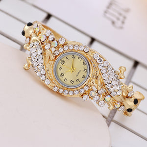 Diamond and gold bracelet watch