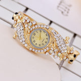 Diamond and gold bracelet watch